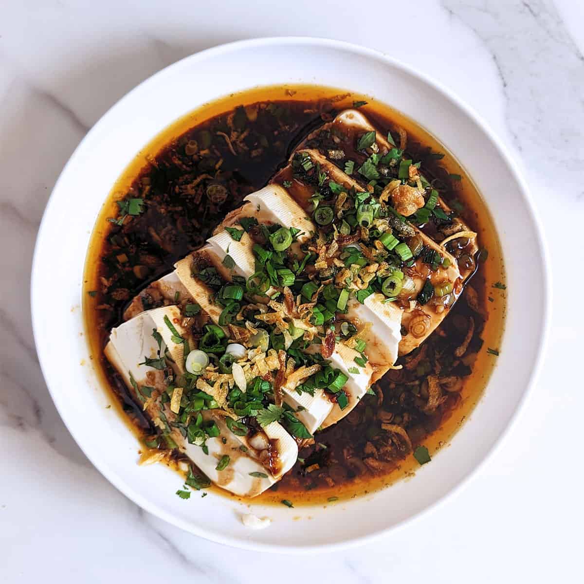 A top down photograph of the steamed tofu dish